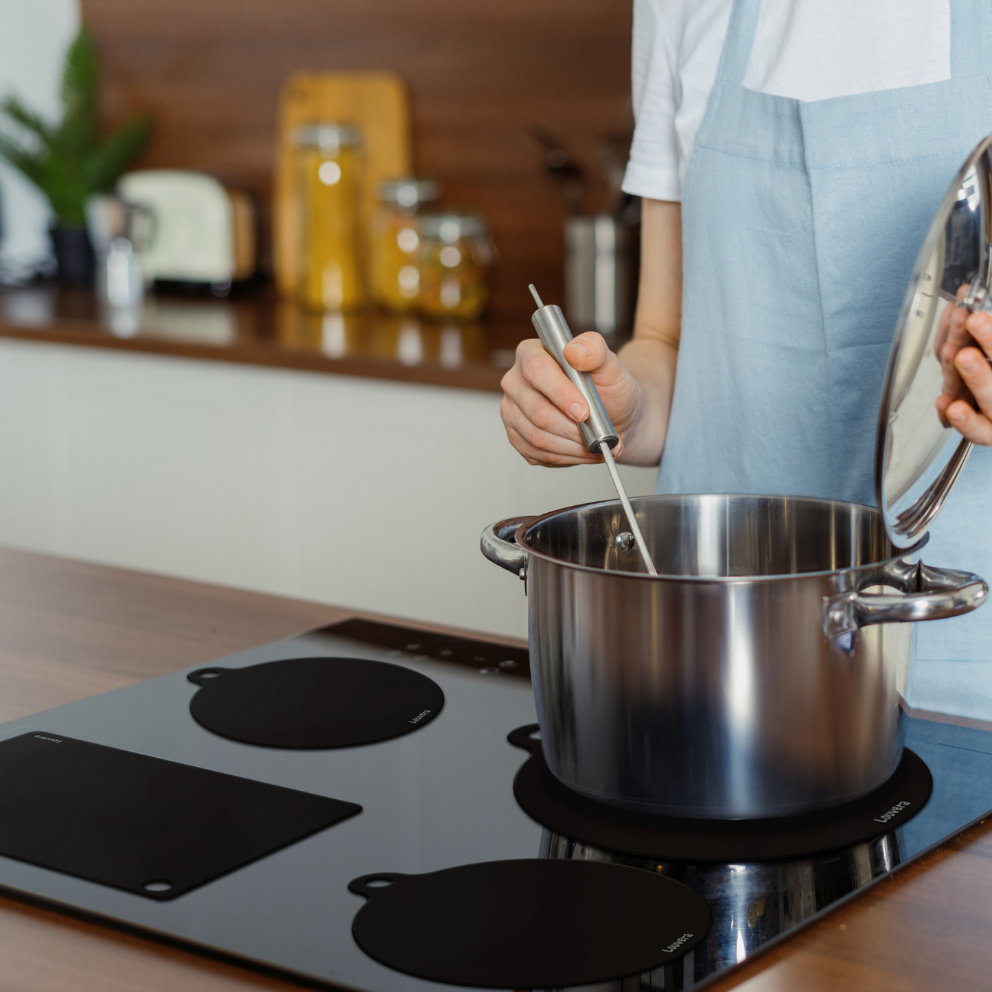 Black Induction Protection Mat - Optimally Safe and Stylish